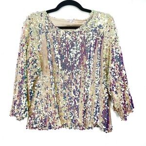 Q+A sequence shimmer New Year’s Eve blouse L18